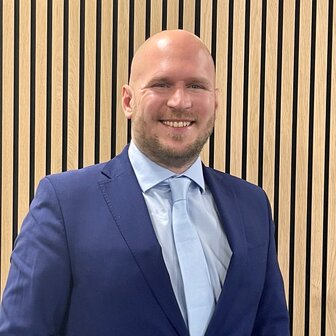 Jon Bethell smiling at the camera